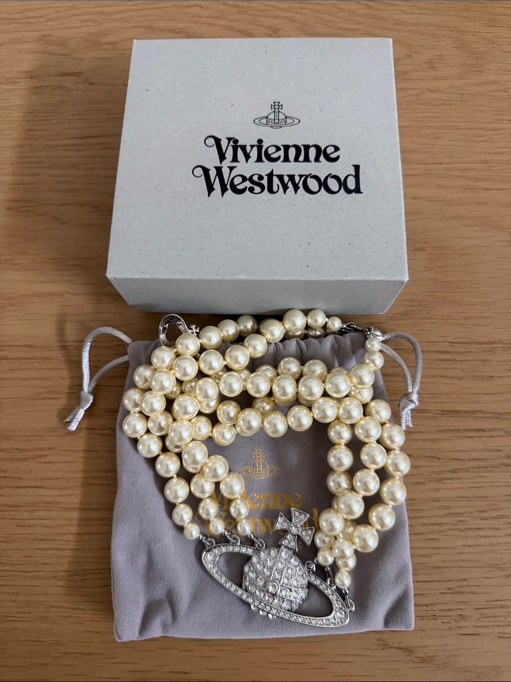 Vivienne Westwood Cream Pearl Multi-Strand Orb Necklace with Crystal Accent